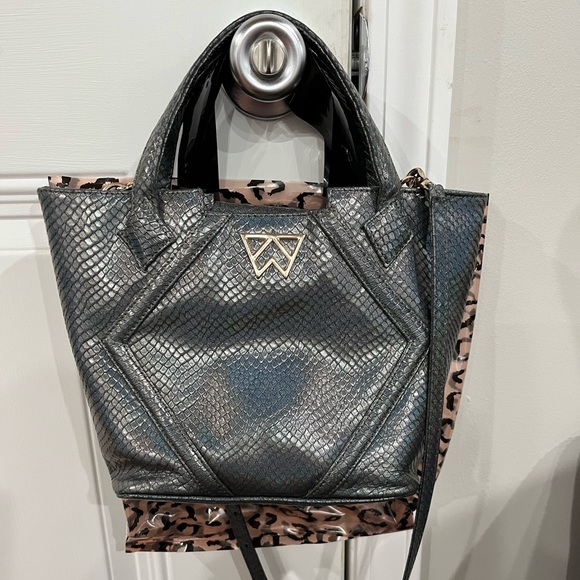 Kelly Wynne mini crossbody. It’s a mermaid shimmery blue - Picture 1 of 1